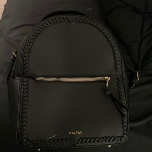 Used small black backpack used as a purse for few months